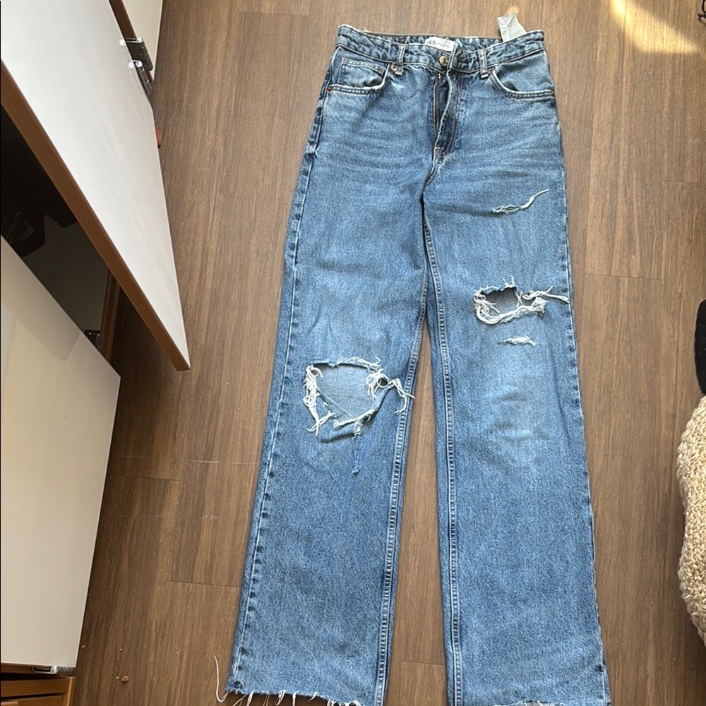 Distressed Blue Jeans